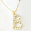 Caroline Svedbom - Letter Necklace B - Gold Crystal